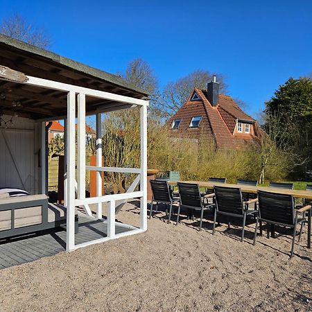 Ferienglück an der Nordsee: Erdgeschoss-Ferienwohnung mit Kamin und Garten Altfunnixsiel Exterior photo