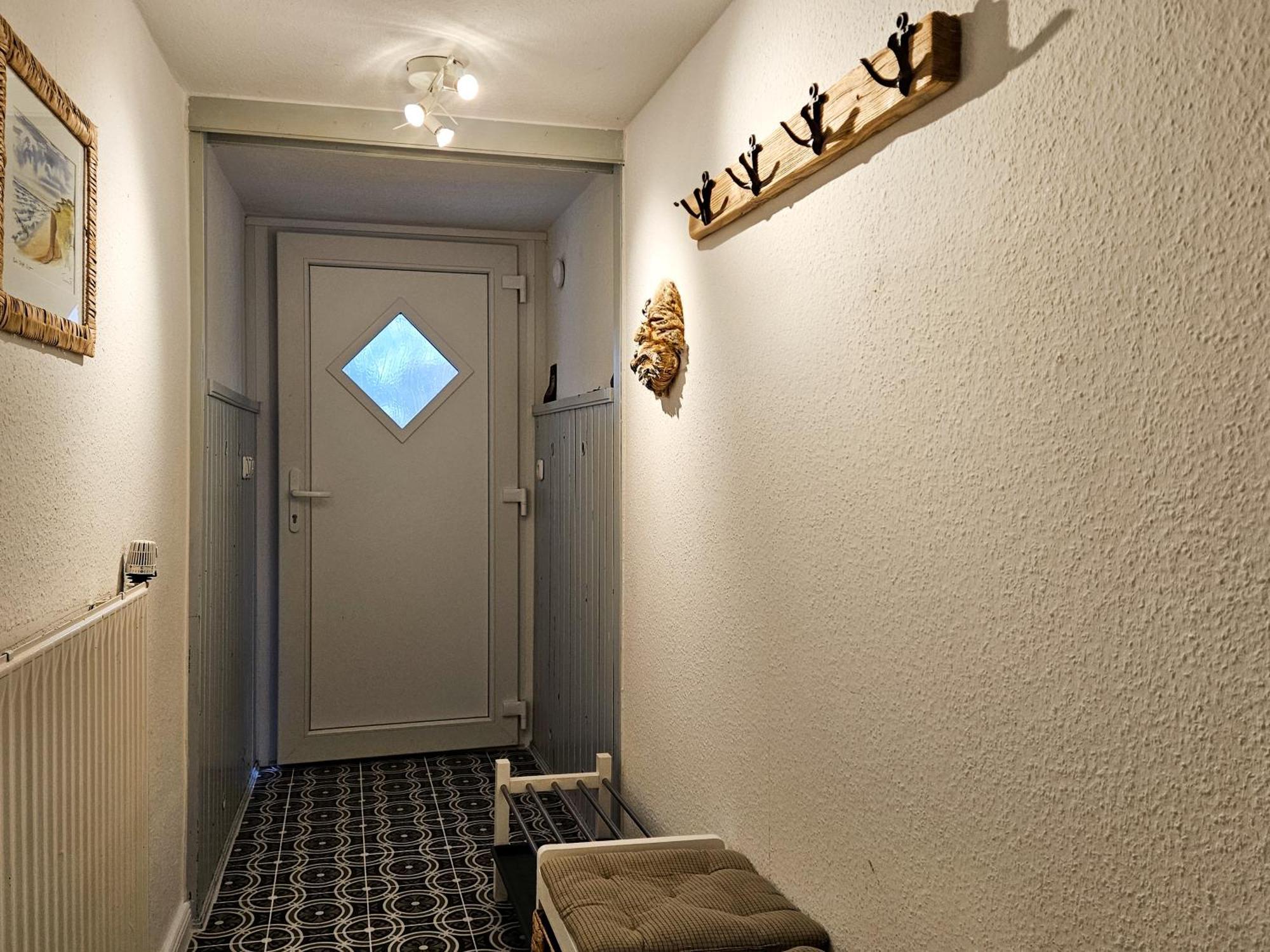 Ferienglück an der Nordsee: Erdgeschoss-Ferienwohnung mit Kamin und Garten Altfunnixsiel Exterior photo